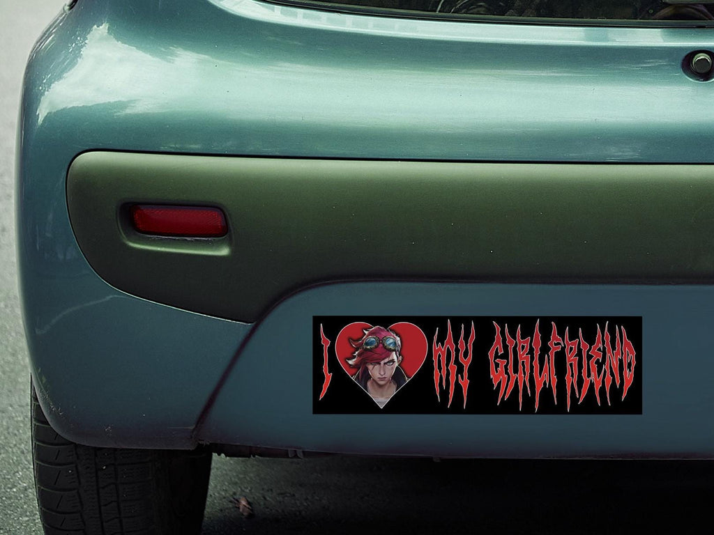 Bumper sticker with a graphic of vi from arcane and text 'I ❤️ my girlfriend' on a car's rear window.