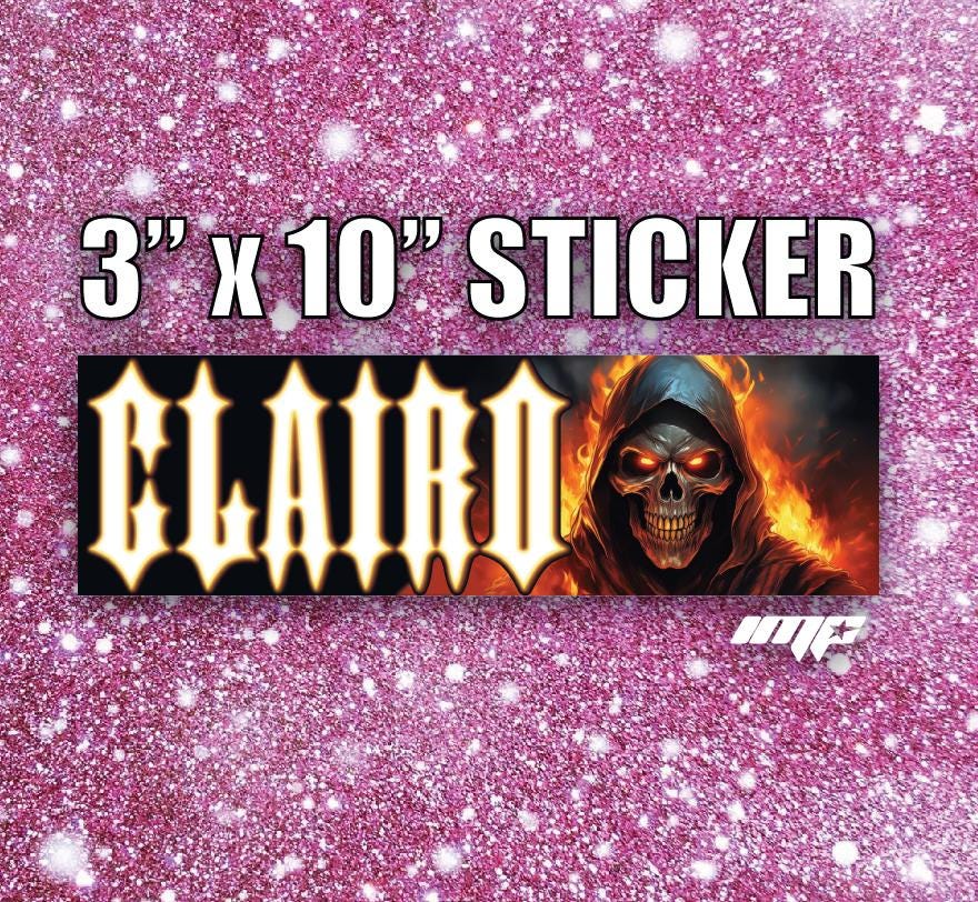 Sticker with a skull design and "CLAIRO" text on a pink glittery background