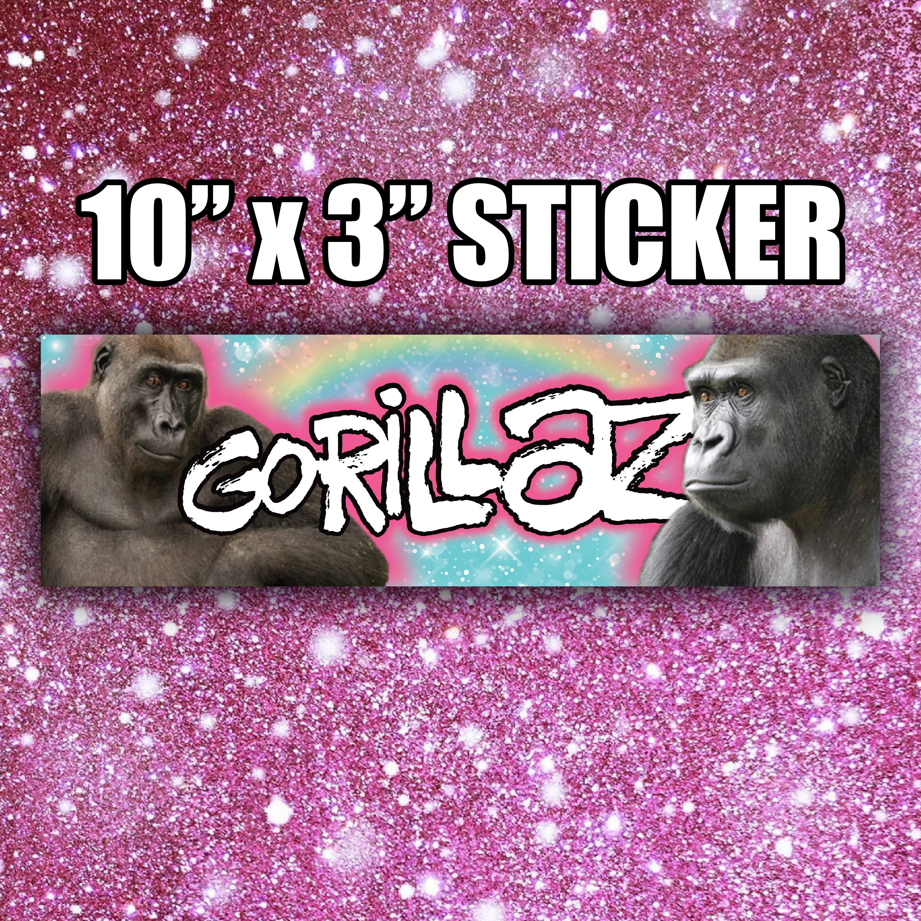 Sticker with gorillas and 'Gorillaz' text on a pink glittery background