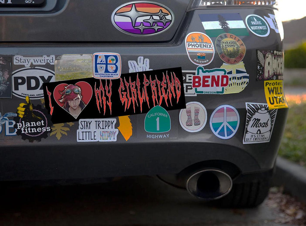 Back of a car with various stickers, including one that says 'I My heart My Girl Friend'.