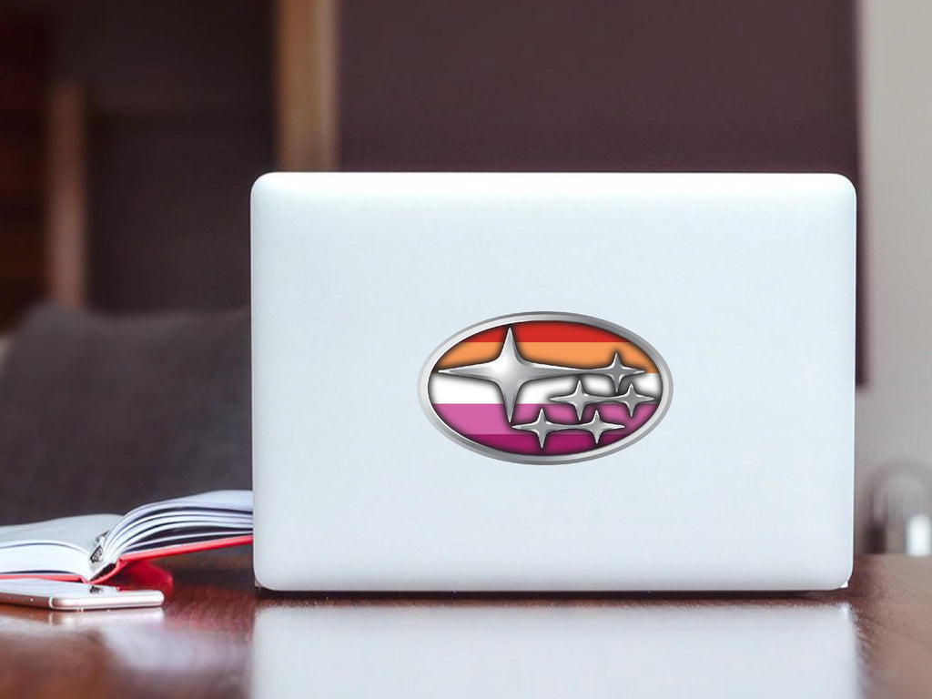 White laptop with a colorful logo on a wooden surface